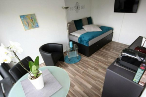 Moderne Wohnung mit Wellnessdusche und Strandkorb